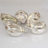 Lot 234 - Four silver pap boats with reeded rims