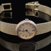 Lot 340 - Nine carat gold eterna lady’s wristwatch.