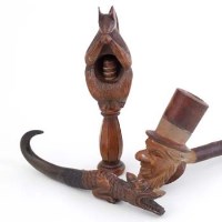 Lot 356 - Treen nutcracker in form of squirrel, carved pipe and horn with carved boot hook (3).