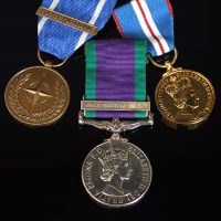 Lot 375 - A General Service Medal 1962 with Air Operations Iraq clasp, NATO Service Medal and Golden Jubilee Medal 2002 (3).