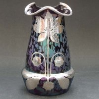 Lot 493 - Loetz overlay purple vase.