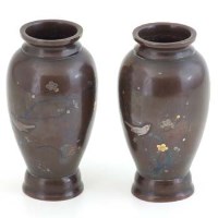 Lot 510 - Pair of bronze oriental vases.