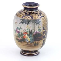 Lot 511 - Japanese miniature vase.