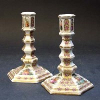 Lot 550 - Pair of German ARcandlesticks.