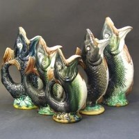 Lot 584 - Five majolica fish jugs