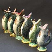 Lot 585 - Six majolica fish jugs