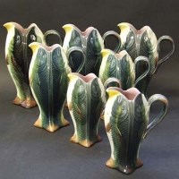 Lot 586 - Seven Majolica fish jugs