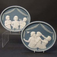 Lot 601 - Pair Mettlach oval plaques