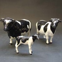 Lot 640 - Beswick Friesian Cow set  including bull, cow and