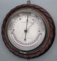 Lot 649 - Circular rope framed aneroid barometer