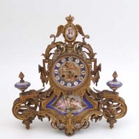Lot 654 - French gilt metal and porcelain mantel clock