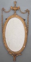 Lot 667 - Classical revival oval wall mirror.