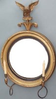 Lot 680 - Circular Gilt Convex Mirror surmonted by eagle with 2 candle sconces
