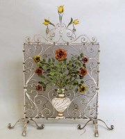 Lot 682 - Painted wrought iron roses firescreen