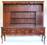 Lot 690 - Mid George III oak dresser.