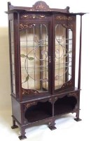 Lot 701 - Early 20th Century Art Nouveau inspired mahogany vitrine