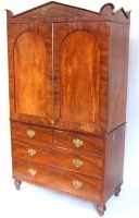 Lot 706 - George IV mahogany press cupboard - pedimented top.