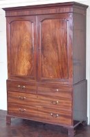 Lot 744 - George III mahogany linen press