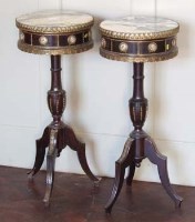 Lot 749 - Pair of gilt mounted ebonised tripod tables with