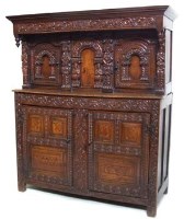 Lot 752 - Carved oak court cupboard
