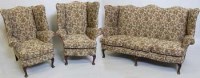 Lot 777 - Winged three piece lounge suite.
