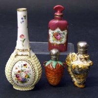 Lot 387 - Four porcelain scent bottles