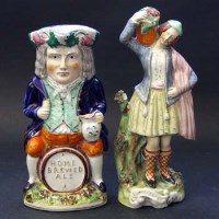 Lot 389 - Staffordshire Toby and a figure