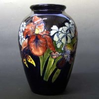 Lot 409 - Moorcroft orchid vase