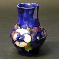 Lot 412 - Moorcroft pansy pattern vase..