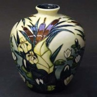 Lot 414 - Moorcroft bull rushes vase.