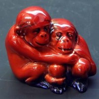 Lot 438 - Royal Doulton flambé monkeys