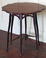 Lot 502 - Morris-style six legged circular table.
