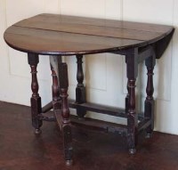 Lot 511 - 18th century oak gate-leg table