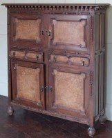 Lot 512 - Jacobean style four-door cabinet