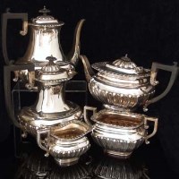 Lot 223 - Silver five piece tea set