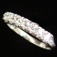 Lot 272 - Seven stone platinum and diamond ring
