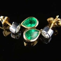 Lot 284 - Pair of 18ct gold emerald and diamond studs