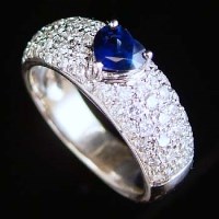 Lot 286 - Sapphire and diamond heart shaped ring
