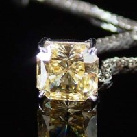 Lot 300 - Yellow radiant cut stone on 18ct white gold chain