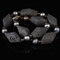 Lot 315 - Black volcanic lava and pearl necklace