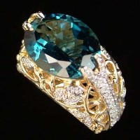 Lot 320 - Topaz and diamond 14 carat gold ring