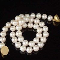 Lot 336 - Cultured freshwater pearl necklace, 10mm