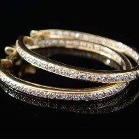 Lot 338 - Martin Flyer diamond hoop earrings