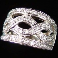 Lot 347 - Guilloche diamond ring