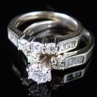 Lot 351 - Pair of diamond rings