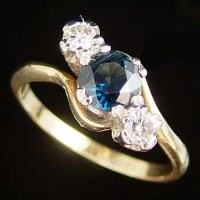 Lot 353 - 18ct gold diamond and sapphire ring
