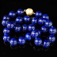 Lot 356 - Lapis lazuli necklace, 14mm
