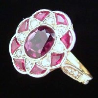 Lot 361 - Ruby and diamond 18ct gold and platinum ring