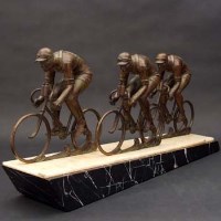 Lot 384 - Art Deco cyclists figure group