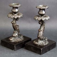 Lot 388 - Pair of brass serpentine candlesticks